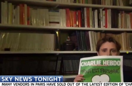 Sky News apologises for showing glimpse of Charlie Hebdo cover before camera swerves away